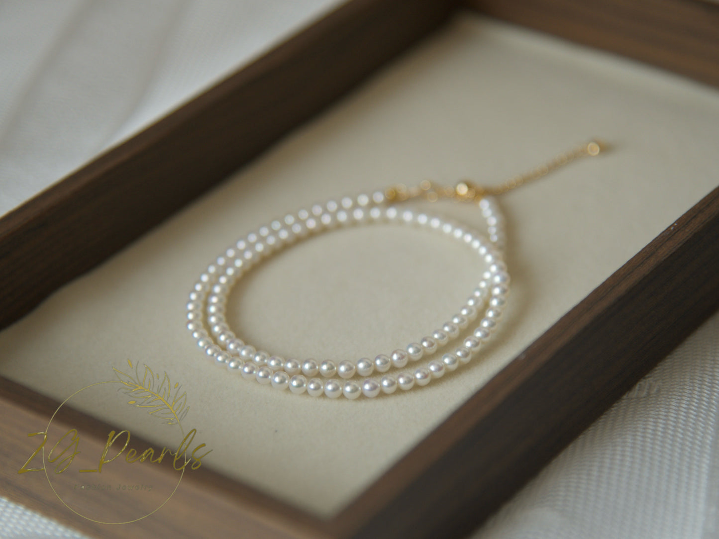 Pearl necklace on a wooden box